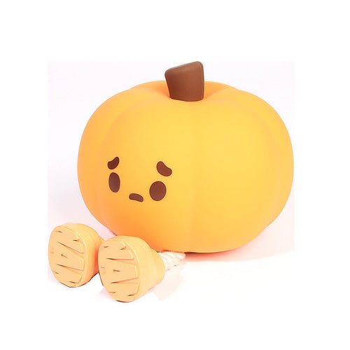 Cute silicone pumpkin night light, dimmable and rechargeable, perfect for kids' Halloween decor and bedside use.