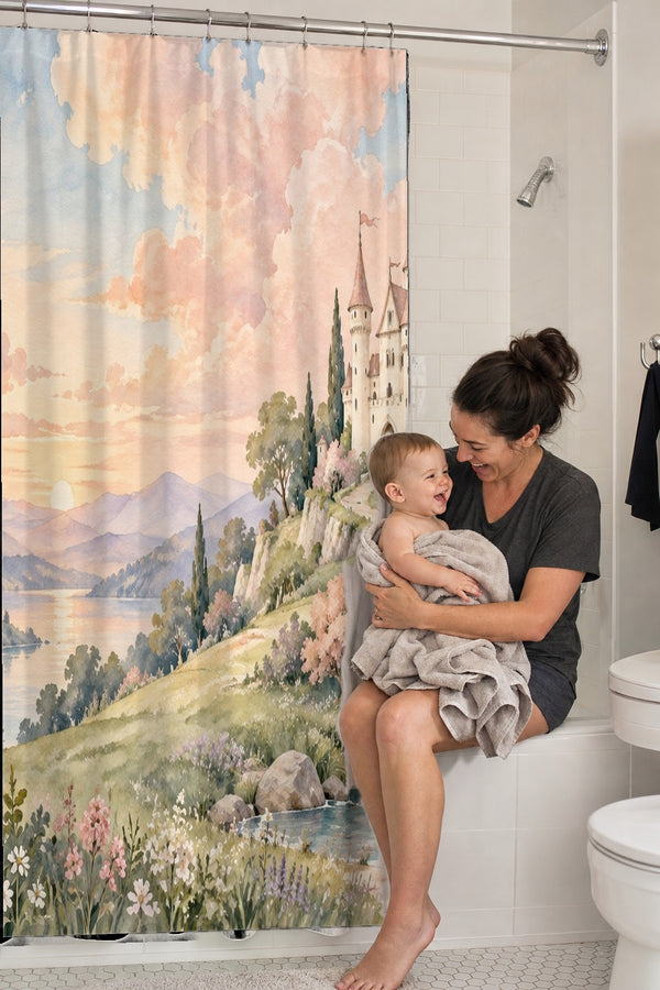 Mom holding her baby on the tub edge next to the Hilltop Castle Fairy Tale shower curtain