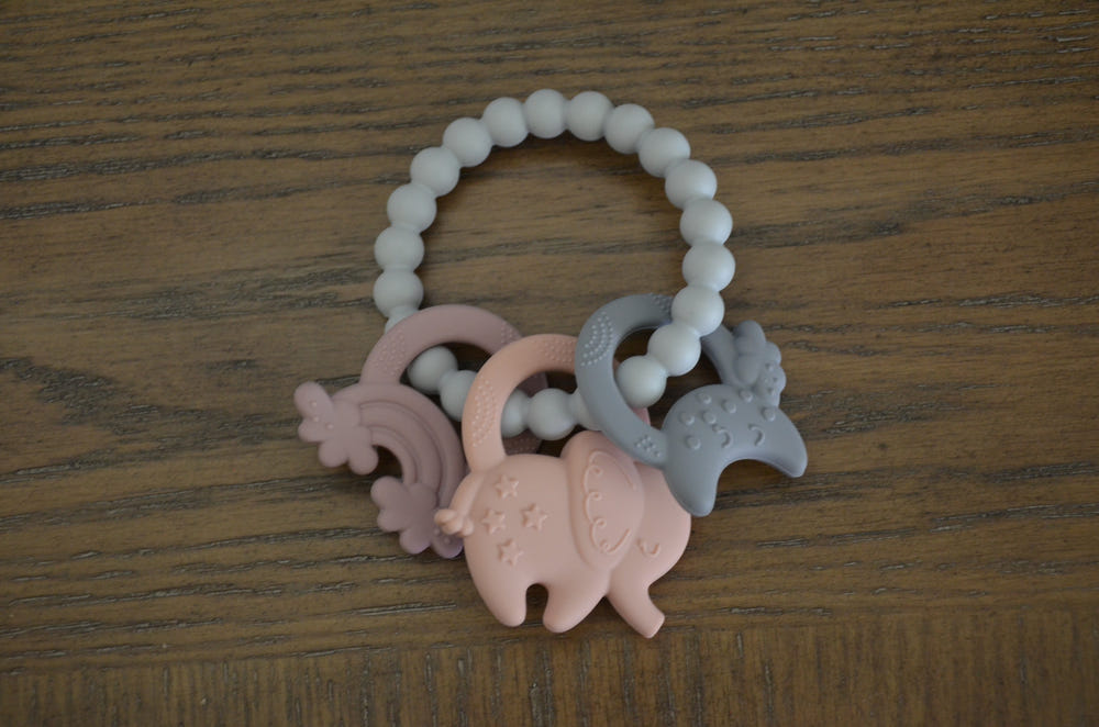 Colorful bubble teething ring for babies, designed to soothe gums and promote healthy teething.