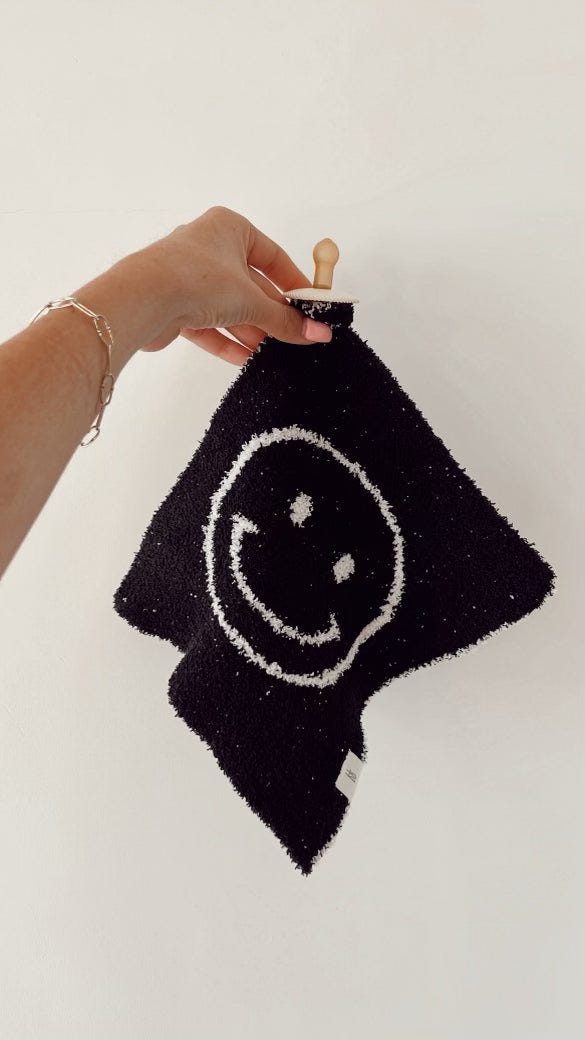 Black & White Just Smile Lovey for babies, featuring a soft design perfect for comfort and cuddling.