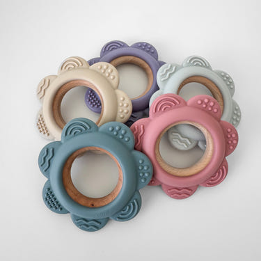 Garden Party Teether Collection: Silicone & Beechwood Flower teether for babies, safe and stylish for soothing gums.