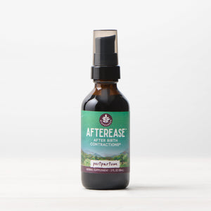 Postpartum Essentials Kit in a gift box, perfect for new moms, displayed at an angle.