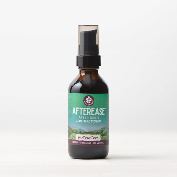 Postpartum Essentials Kit in a gift box, perfect for new moms, displayed at an angle.