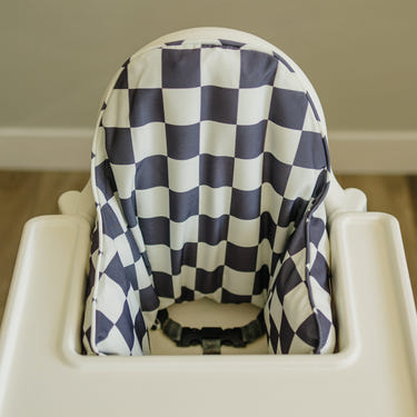 Black Checker IKEA Antilop Cushion Cover for baby seat, stylish and comfortable accessory for infant seating.