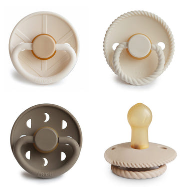 FRIGG Natural Rubber Pacifier 4-Pack in assorted colors for babies, promoting comfort and soothing.