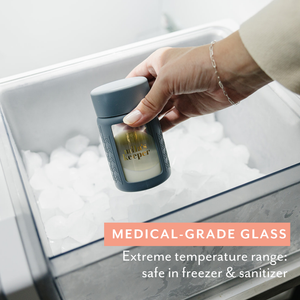 Set of 2 glass breast milk bottles, ideal for safe and stylish breast milk storage.