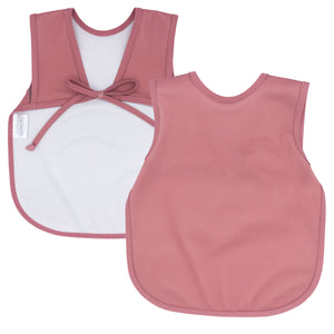 Solid blush minimalist bapron for babies, stylish and practical for mealtime messes.