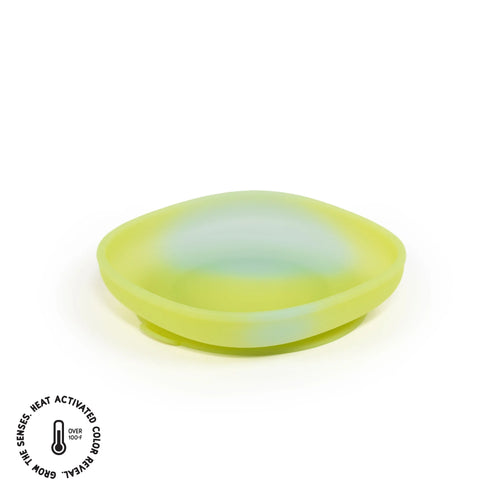 Color changing suction plate for babies, perfect for mealtime fun and mess-free eating.