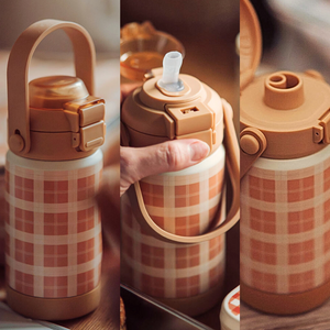 Sip + Chug 2 in 1 Thermo Water Bottle 24 oz. in Fern color, angled view showcasing its sleek design and functionality.