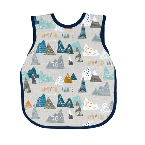 "Adventure Awaits Bapron for babies, angle view showcasing fun design and practical features for mealtime."