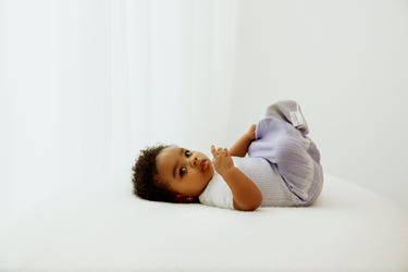 Lavender Arms Out™ Short Sleeve Sleep Sack for babies, ensuring comfort and safety during sleep.