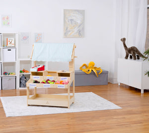 Cypress Wooden Market Stand for kids, perfect for pretend play with storage, viewed at a 15-degree angle.
