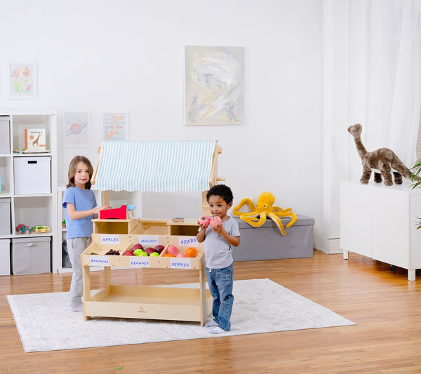 Cypress Wooden Market Stand for kids, perfect for indoor pretend play with storage, shown from angle 16.
