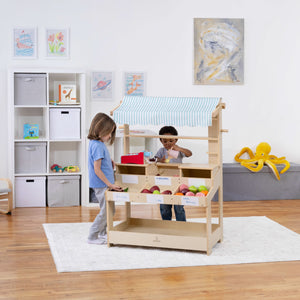 Cypress Wooden Market Stand for kids' pretend play, featuring storage, viewed from angle 4.