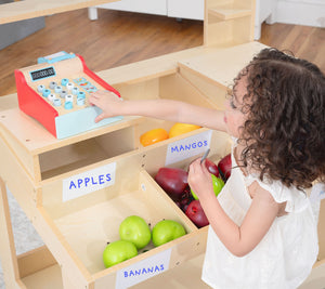 Cypress Wooden Market Stand for kids, perfect for pretend play with storage, shown from angle 3.