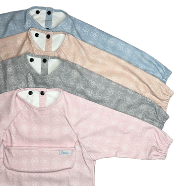 Grayson Long Sleeve Bib in Blossom - stylish and practical baby feeding accessory.