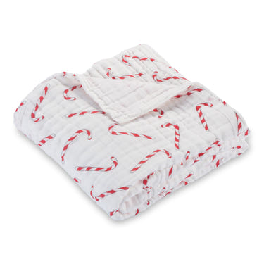 Soft cotton muslin candy cane quilt for babies, perfect for cozy naps and stylish nursery decor.
