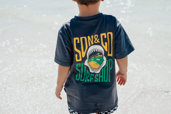 Cute Shark Bite T-Shirt for babies and toddlers, perfect for playful outfits and ocean-themed adventures.