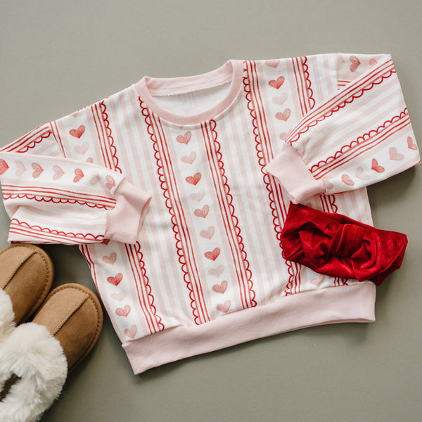 Laced with Love Crewneck Sweatshirt for babies, cozy and stylish, shown from angle 14.