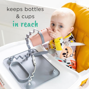 "Angle 3 view of Bottle Bungee, a secure and convenient solution for holding baby bottles."