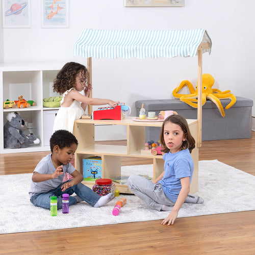 Holly Wooden Market Stand for kids' pretend play, featuring a charming display shelf for indoor fun.