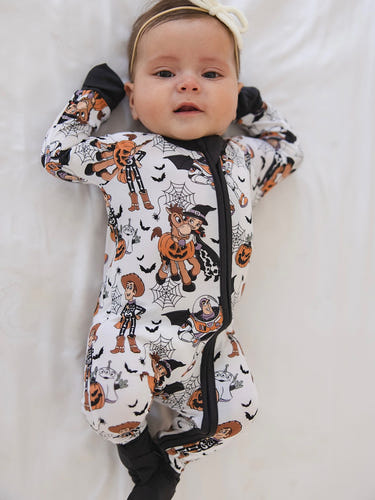 Howdy Boo Zippy zip pajamas for babies, soft and cozy footies in vibrant colors, perfect for comfort and style.