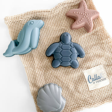Bodhi Sand Mold Set for kids - colorful beach toys for creative sand play and fun at the beach.