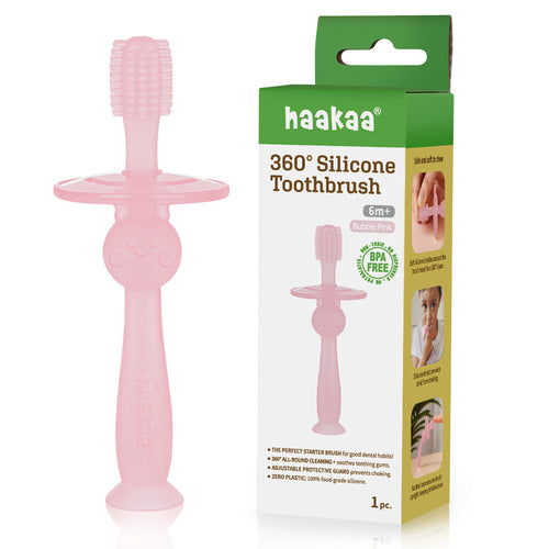 Haakaa 360° Silicone Toothbrush for babies, angled view showcasing its soft bristles and ergonomic design for oral care.