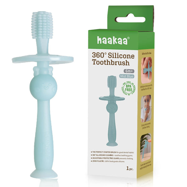 Haakaa 360° Silicone Toothbrush for babies, angled view showcasing soft bristles for gentle oral care.