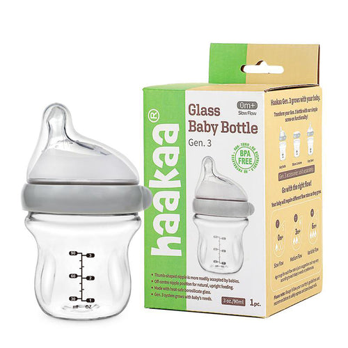 Haakaa Generation 3 Glass Baby Bottle 3 oz, angled view showcasing its sleek design and safe materials for infants.