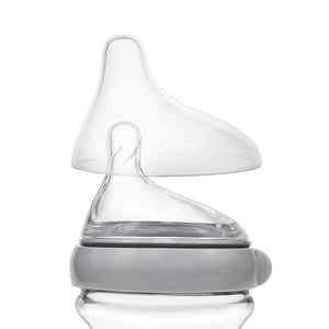 Haakaa Gen. 3 Orthodontic Nipple Replacement Cap for baby bottles, angle view, essential bottle accessory.