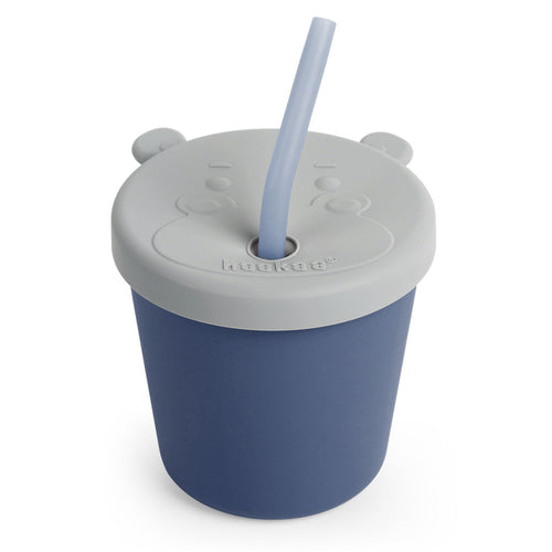 Haakaa Jolly Hippo Silicone Sippy Cup, angled view, perfect for babies transitioning to independent drinking.