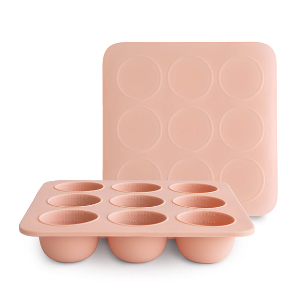 "Baby food freezer tray for easy storage and on-the-go meals, shown from angle 3."