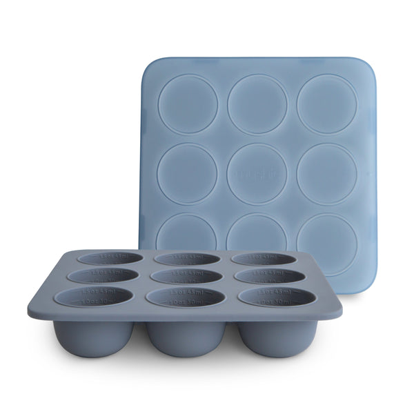 Baby food freezer tray at an angle, perfect for storing and freezing homemade baby meals on-the-go.