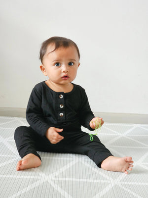 Newborn baby boy black outfit set with top, bottom, and hat - stylish onesie for infants.