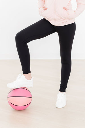 Balanced Black Active Legging for babies, showcasing a stylish and comfortable design from an angled perspective.