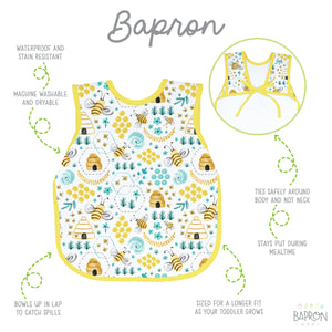 "Busy Bees Bapron in vibrant colors, angle 4 view showcasing its unique design for mess-free feeding."