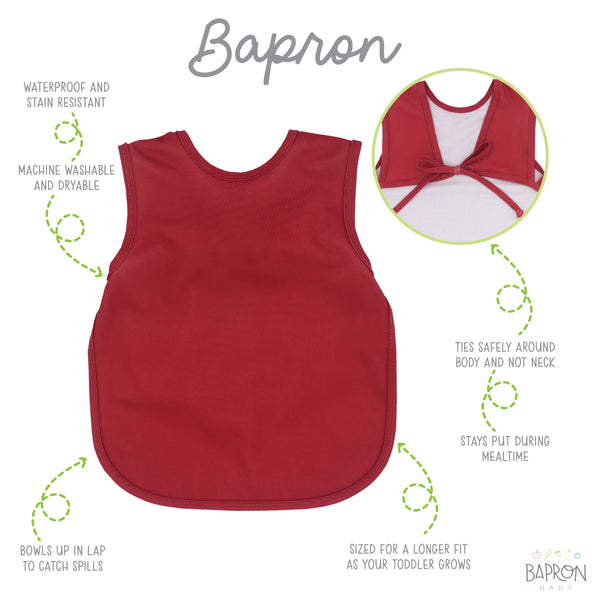 Solid cranberry minimalist bapron for babies, showcasing a stylish and functional design from angle 4.