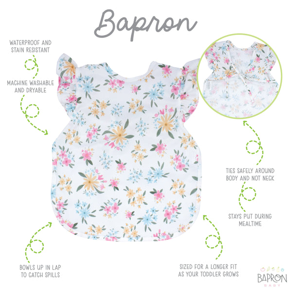 Pastel Floral Flutter Bapron for babies, angled view showcasing its cute design and practical features.