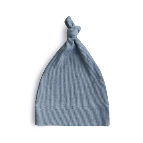 Ribbed baby beanie in soft fabric, perfect for keeping little heads warm and stylish.