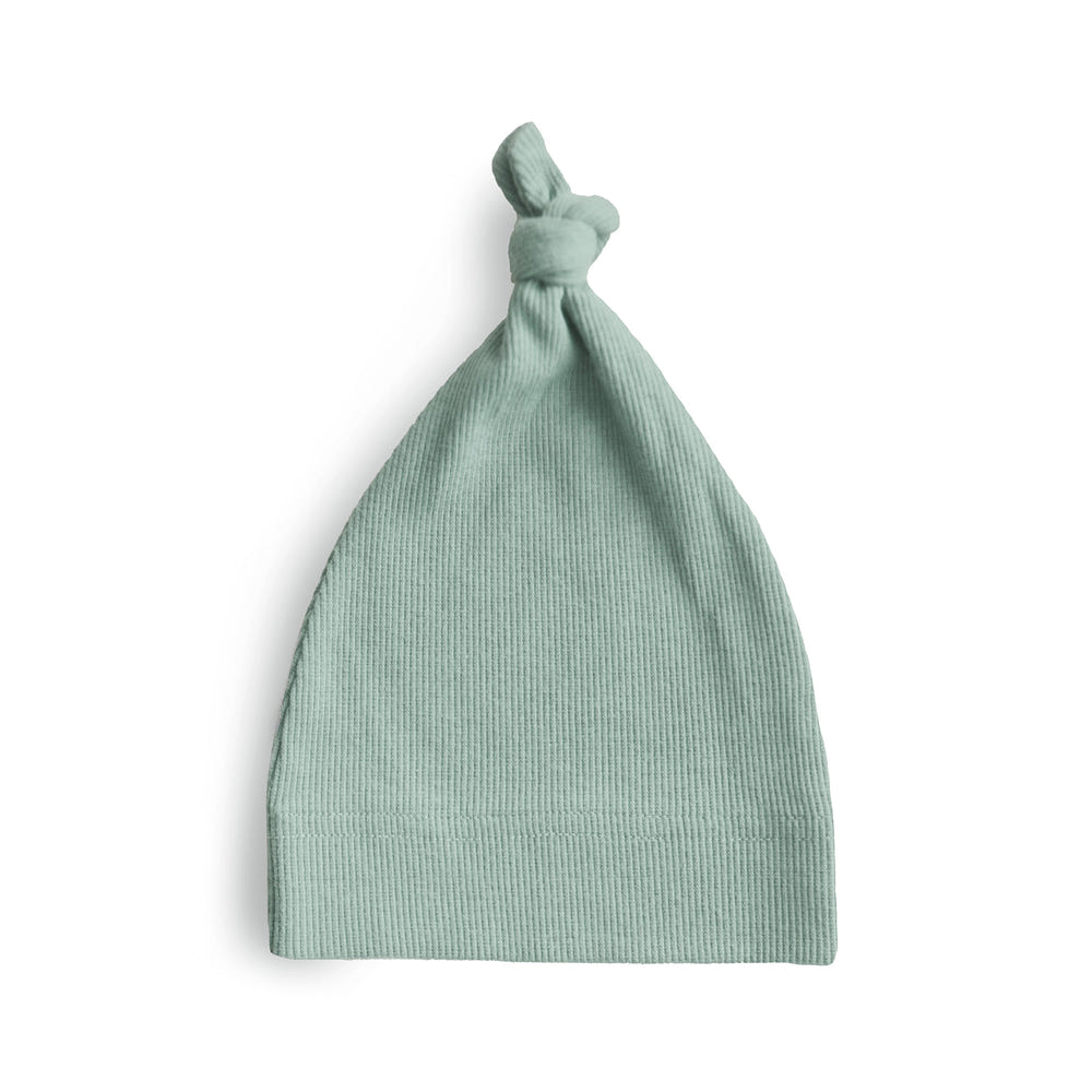 Ribbed baby beanie in soft fabric, perfect for keeping little heads warm and stylish.