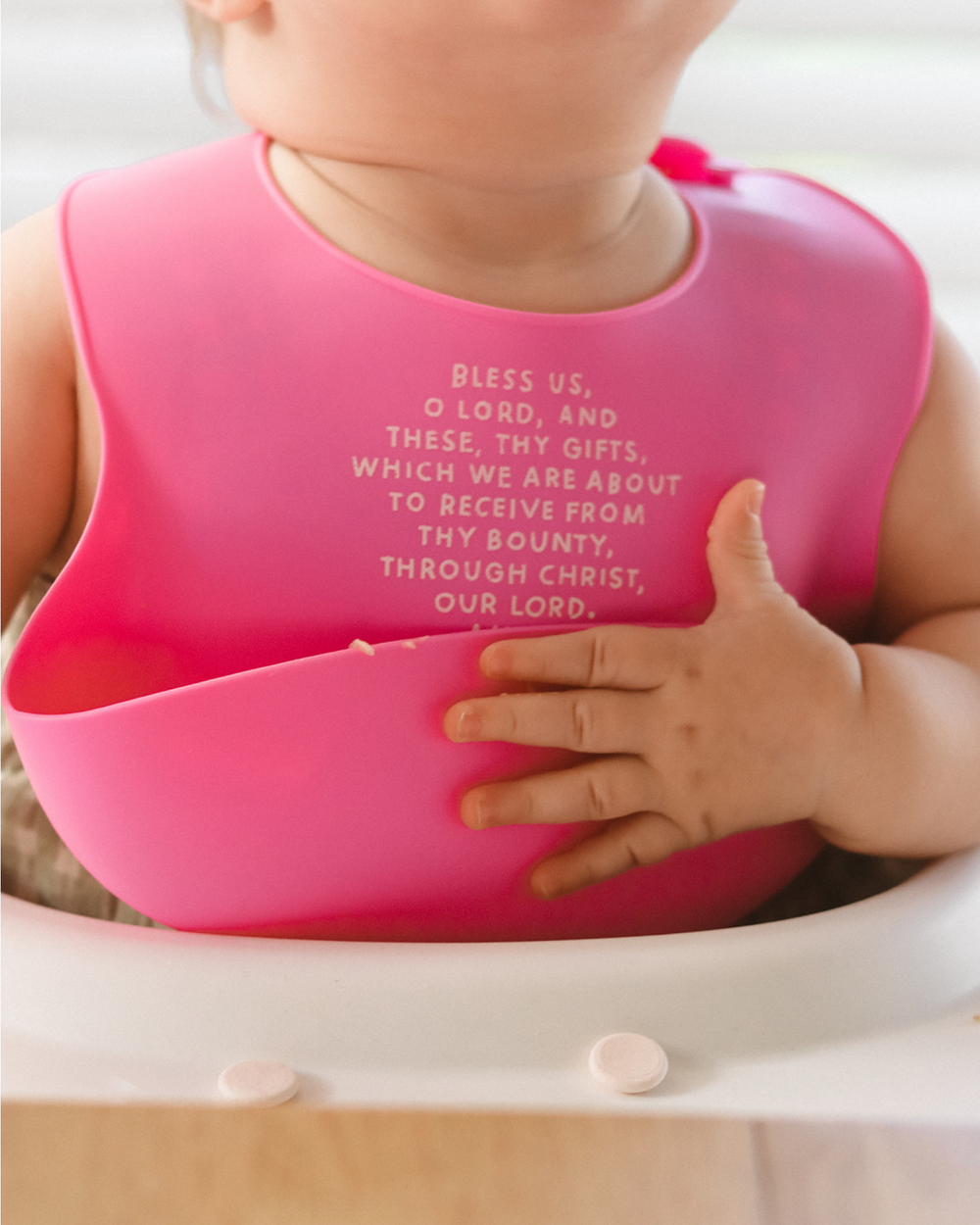 "Meal Blessing Silicone Bib in vibrant colors, perfect for mess-free feeding and easy cleanup for babies."