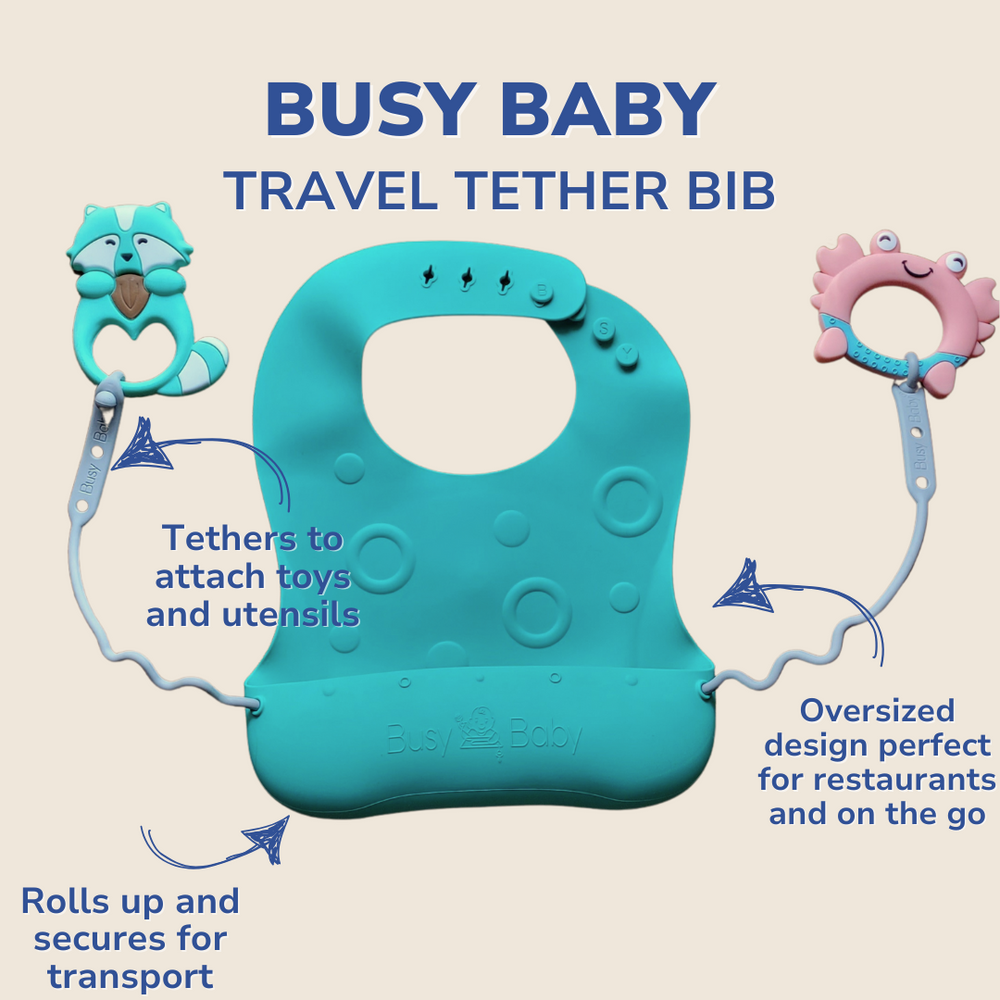 Travel Tether Bib in soft silicone, perfect for mess-free feeding on the go.