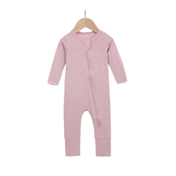 Solid Bamboo Zippy Pajamas in various colors, angle view showcasing soft fabric and zip design for babies.