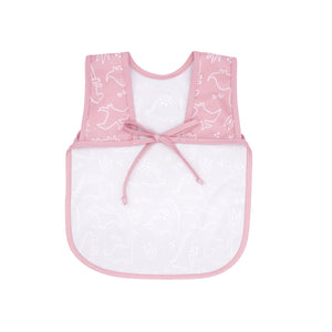Blush Dino Friends Bapron for babies, featuring playful dinosaur design, angled view showcasing its unique style.