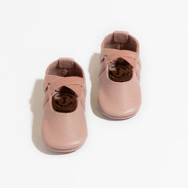 Blush ballet slipper baby shoe, perfect for little dancers and stylish infants.