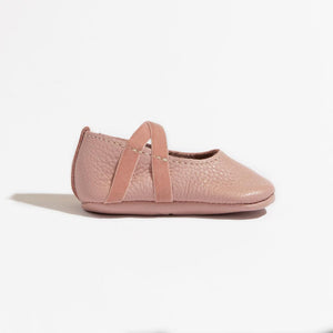 Blush ballet slipper baby shoe in angle view, perfect for little dancers and stylish infants.