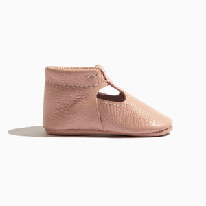 Blush T-Bar baby shoe in angle 3, featuring a stylish design perfect for little feet.