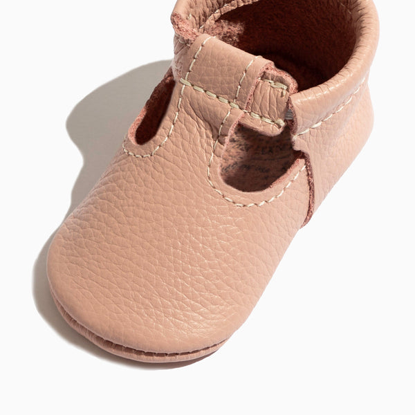 Blush T-Bar baby shoe from angle 2, featuring a stylish design perfect for little ones.
