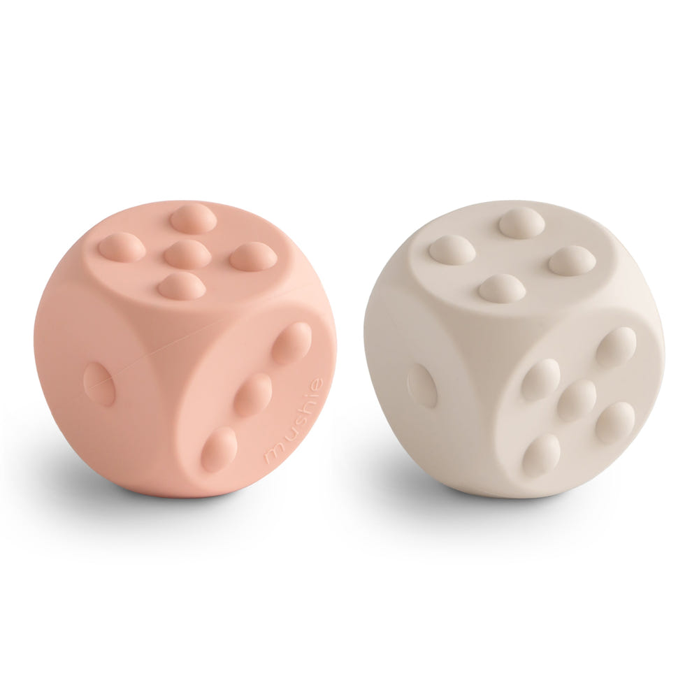 Colorful Dice Press Toy for babies, promoting sensory play and fine motor skills development.